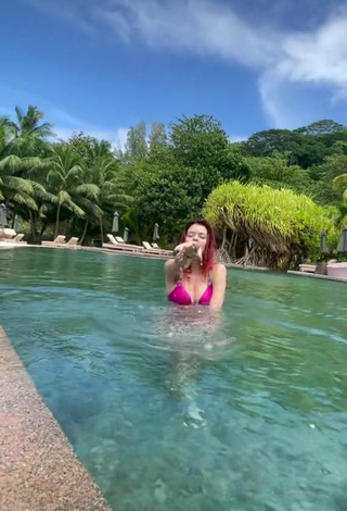 2. Sultry Shelby Olya Shows Cleavage in Pink Bikini at the Swimming Pool