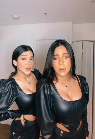 Luscious Melanie & Meila Shows Cleavage in Bodysuit