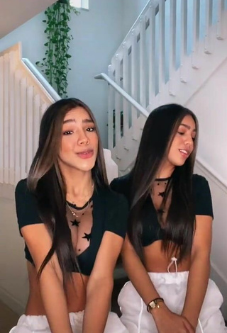 2. Titillating Melanie & Meila in Black Crop Top