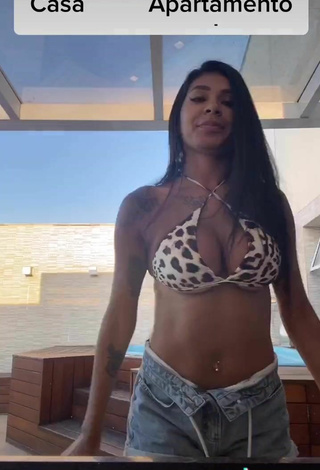 5. Titillating Jully Oliveira Shows Cleavage in Leopard Bikini Top