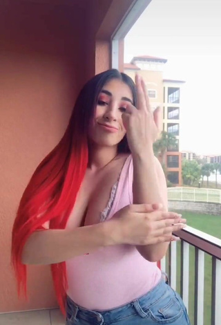 Sultry Ana Daniela Martínez Buenrostro Shows Cleavage in Pink Top on the Balcony