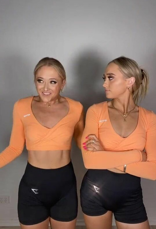 Titillating Sam & Teagan Rybka in Orange Crop Top