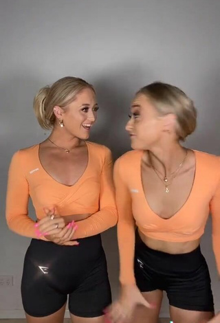 4. Titillating Sam & Teagan Rybka in Orange Crop Top