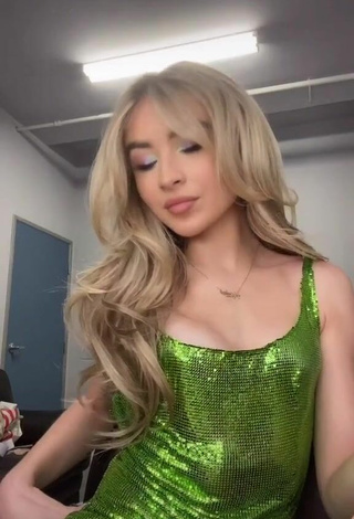 Sultry Sabrina Carpenter in Green Dress