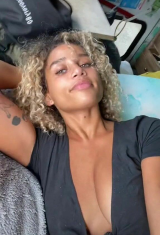 Sultry Salah Brooks Shows Cleavage in Black Crop Top