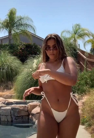 2. Sienna Mae Gomez in Seductive White Bikini