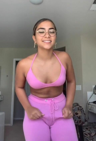 Titillating Sienna Mae Gomez in Pink Bikini Top