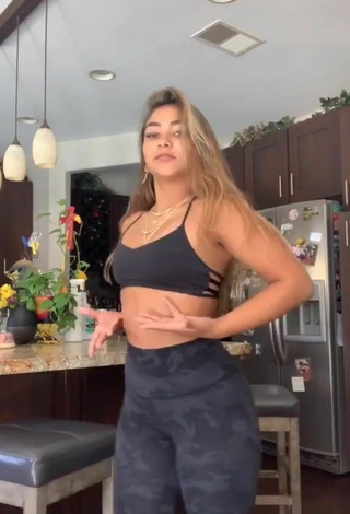 2. Titillating Sienna Mae Gomez in Black Crop Top