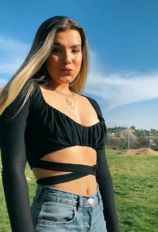 Hot Sarah-Jade Bleau Shows Cleavage in Black Crop Top