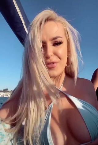 2. Cute Tana Mongeau Shows Cleavage in Bikini Top