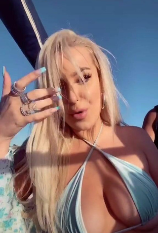 3. Cute Tana Mongeau Shows Cleavage in Bikini Top