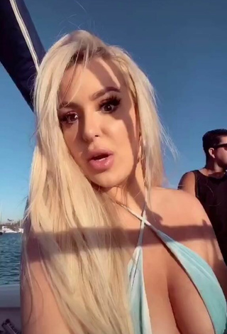 6. Cute Tana Mongeau Shows Cleavage in Bikini Top