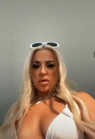 2. Sexy Tana Mongeau in White Bikini Top