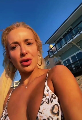 2. Luscious Tana Mongeau in Bikini Top at the Beach