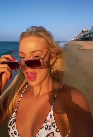 4. Luscious Tana Mongeau in Bikini Top at the Beach