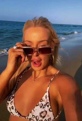 5. Luscious Tana Mongeau in Bikini Top at the Beach