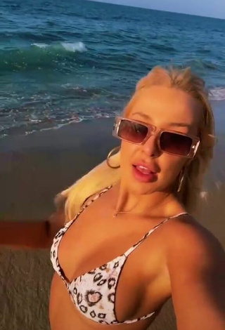 6. Luscious Tana Mongeau in Bikini Top at the Beach