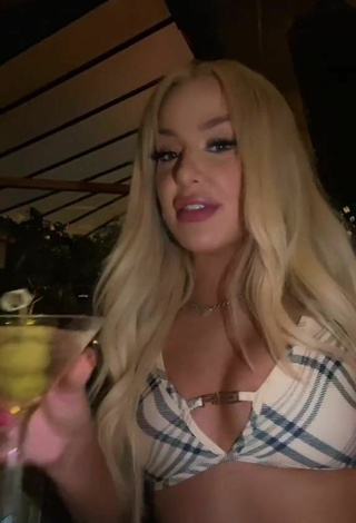 Sultry Tana Mongeau Shows Cleavage in Bikini Top