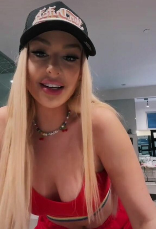 Sultry Tana Mongeau Shows Cleavage in Red Crop Top