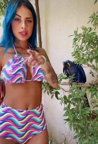 Titillating MC Tati Zaqui in Bikini