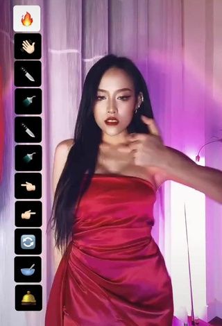 2. Sultry Trà Đặng in Red Dress