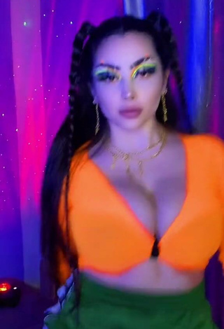 4. Cute Vai Monroe Shows Cleavage in Orange Crop Top