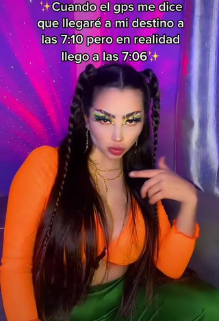 4. Beautiful Vai Monroe Shows Cleavage in Sexy Orange Crop Top