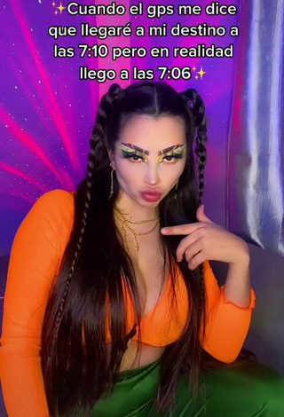 5. Beautiful Vai Monroe Shows Cleavage in Sexy Orange Crop Top