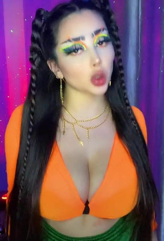 Titillating Vai Monroe Shows Cleavage in Orange Crop Top and Bouncing Boobs