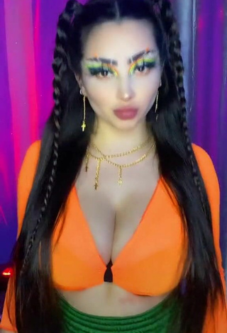 3. Titillating Vai Monroe Shows Cleavage in Orange Crop Top and Bouncing Boobs