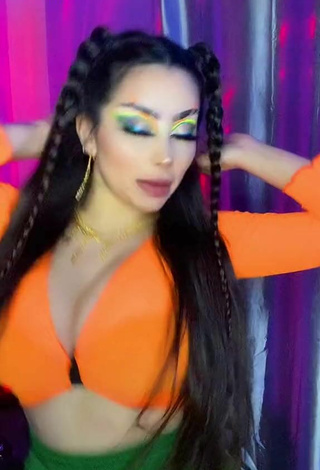 4. Titillating Vai Monroe Shows Cleavage in Orange Crop Top and Bouncing Boobs