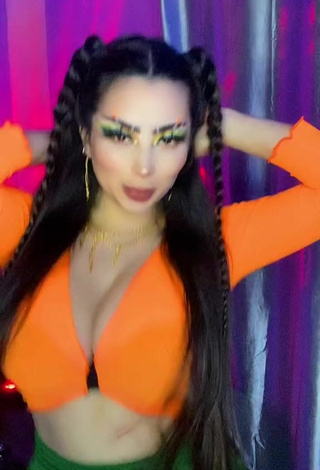 5. Titillating Vai Monroe Shows Cleavage in Orange Crop Top and Bouncing Boobs