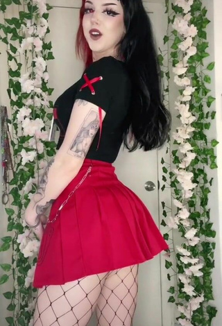 Sultry Caroline Carr in Red Skirt