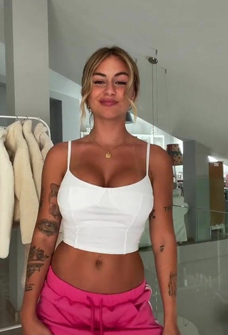 Titillating Abril Cols Shows Cleavage in White Crop Top