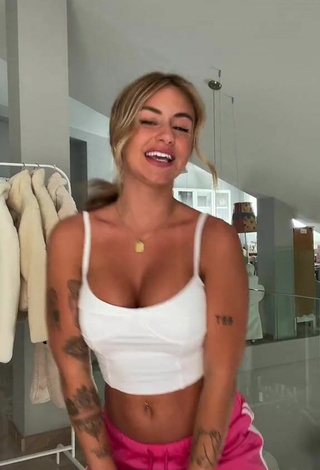 4. Titillating Abril Cols Shows Cleavage in White Crop Top