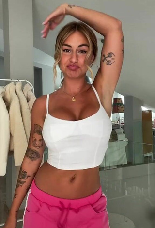 5. Titillating Abril Cols Shows Cleavage in White Crop Top