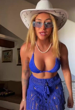 Luscious Abril Cols Shows Cleavage in Blue Bikini Top (Underboob)