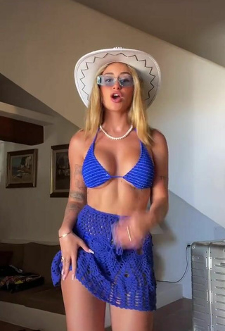 2. Luscious Abril Cols Shows Cleavage in Blue Bikini Top (Underboob)