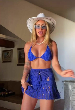 3. Luscious Abril Cols Shows Cleavage in Blue Bikini Top (Underboob)