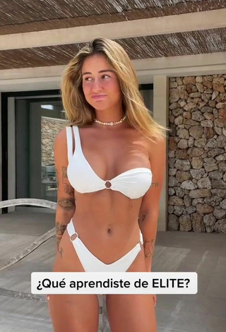 Abril Cols Shows Cleavage in Cute White Bikini