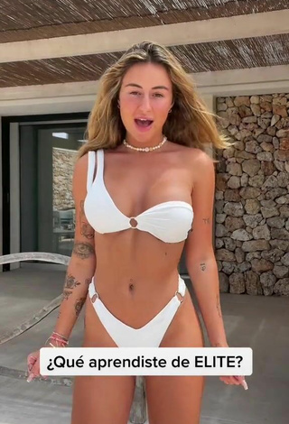 2. Abril Cols Shows Cleavage in Cute White Bikini