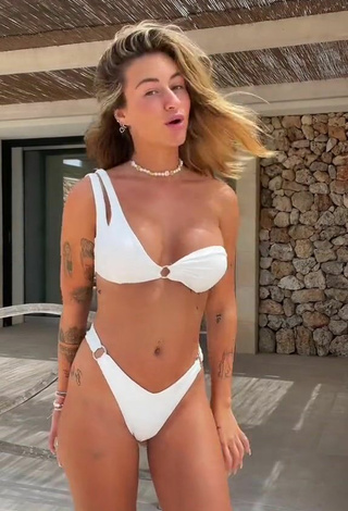 5. Abril Cols Shows Cleavage in Cute White Bikini