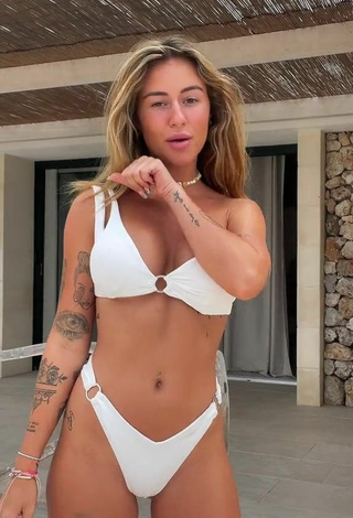 4. Abril Cols Looks Cute in White Bikini