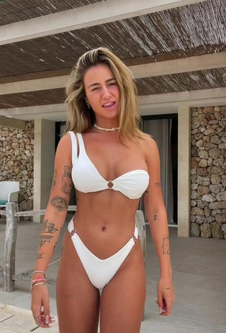 Hottie Abril Cols Shows Cleavage in White Bikini