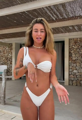 4. Hottie Abril Cols Shows Cleavage in White Bikini