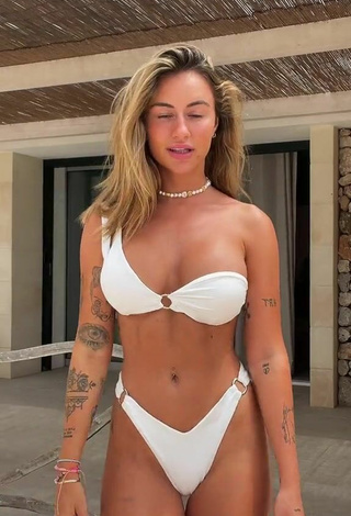 Cute Abril Cols Shows Cleavage in White Bikini