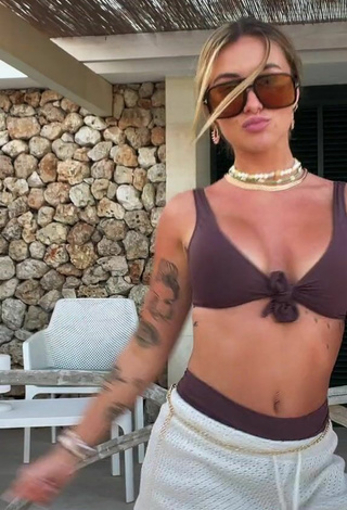 5. Beautiful Abril Cols in Sexy Brown Bikini Top