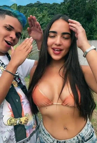 4. Sweetie Aline Borges Shows Cleavage in Peach Bikini Top