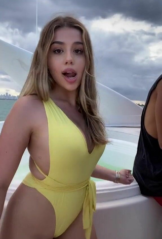 4. Luscious Amanda Díaz in Yellow Swimsuit