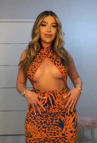 3. Sexy Amanda Díaz in Leopard Dress (Underboob)